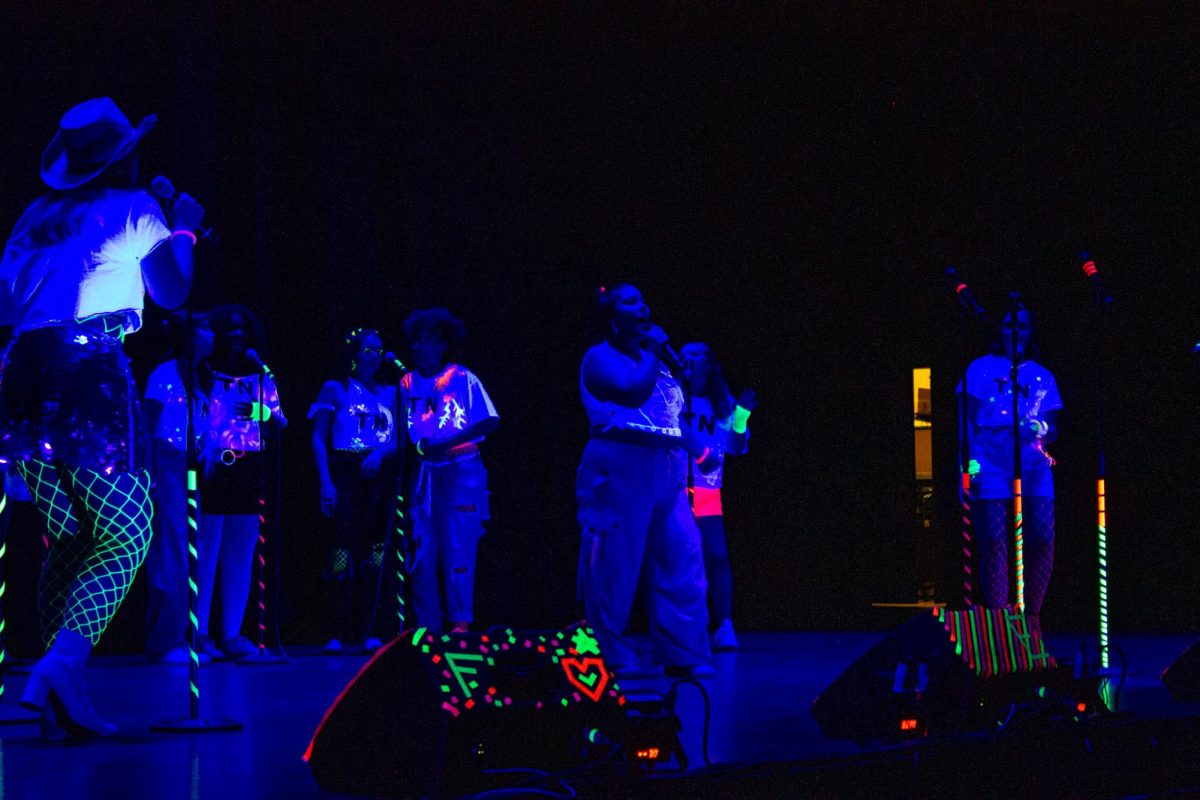 CNU A cappella group Take Note performing at Glow, photo by Amanda Eacho