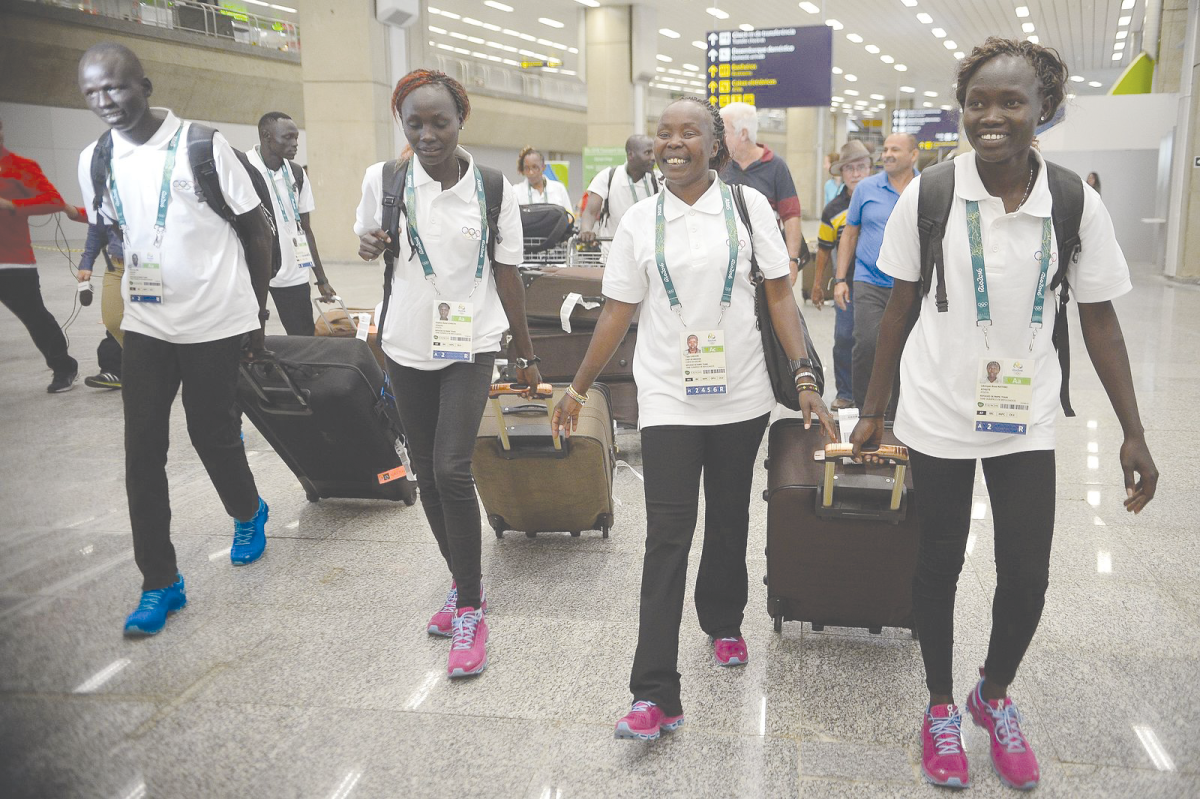 The refugee Olympic team arriving to Rio for the 2016 Summer Olympics. Rio 2016 Refugees by Fernando Frazão is licensed under CC BY 3.0 BR DEED.
