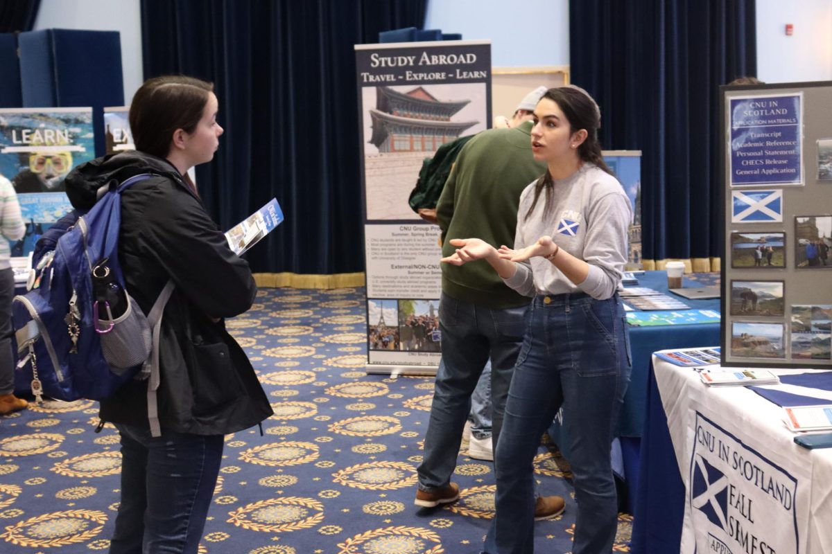 CNU Student talking with a person from the CNU in Scotland Program