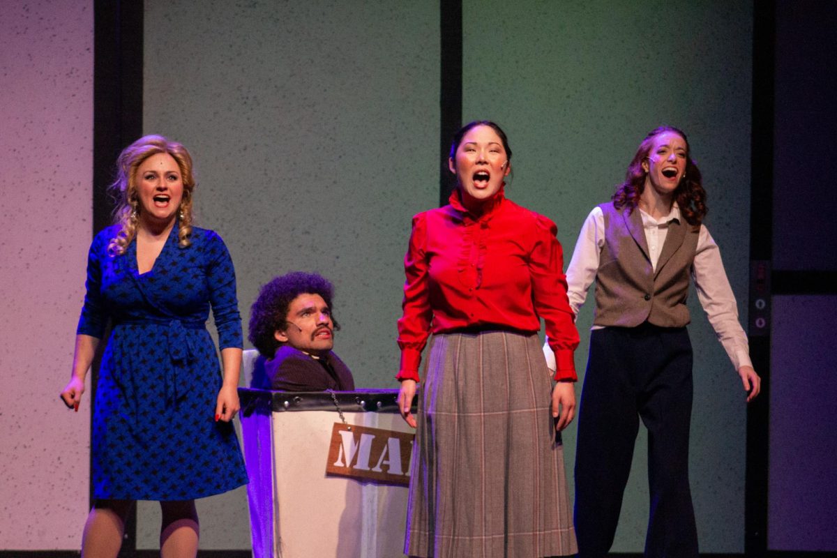 L to R: Doralee, Mr. Hart, Judy and Violet, played by Kimberlie Pagan, Jimmy Grimes, Mia Kennedy and
Hannah Cecil, singing “Shine like the Sun” from 9 to 5, photo by Amanda Eacho