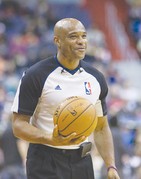 NBA referee Tre Maddox
officiating a basketball game.
Tre Maddox, NBA referee by
Keith Allison is licensed under the CC By SA 2.0 Deed.