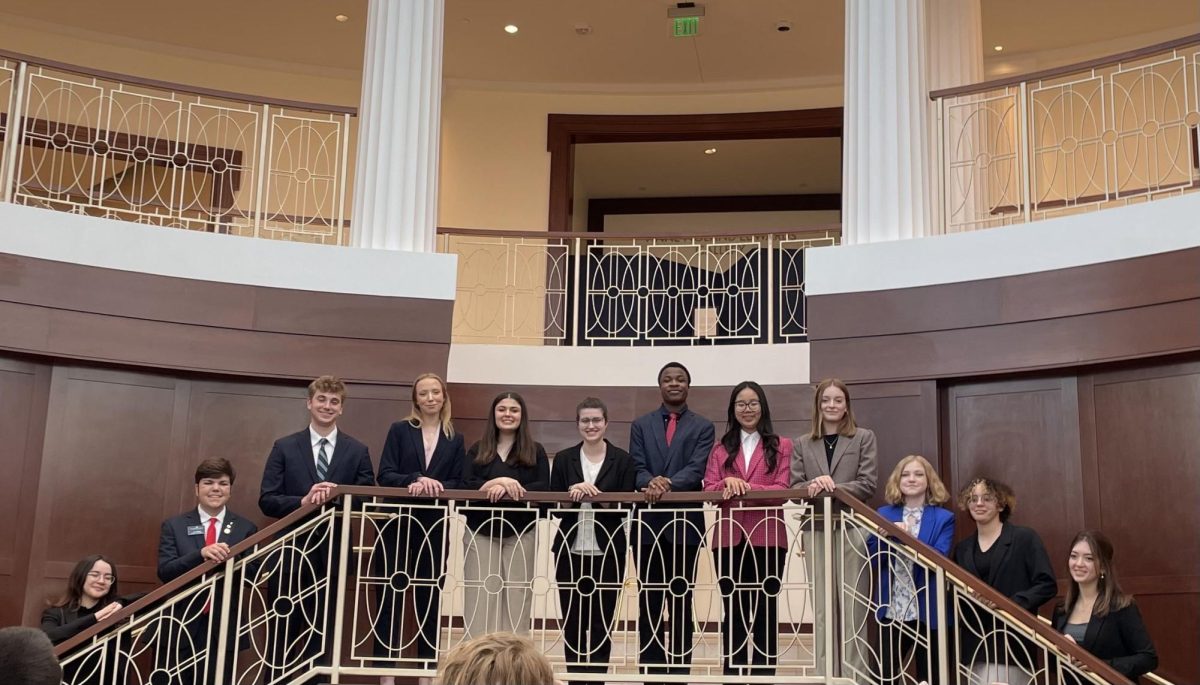 New members of the Student Honor Council posing for a photo on the
steps of the Torggler after their induction ceremony; taken by Adrianna
Cline