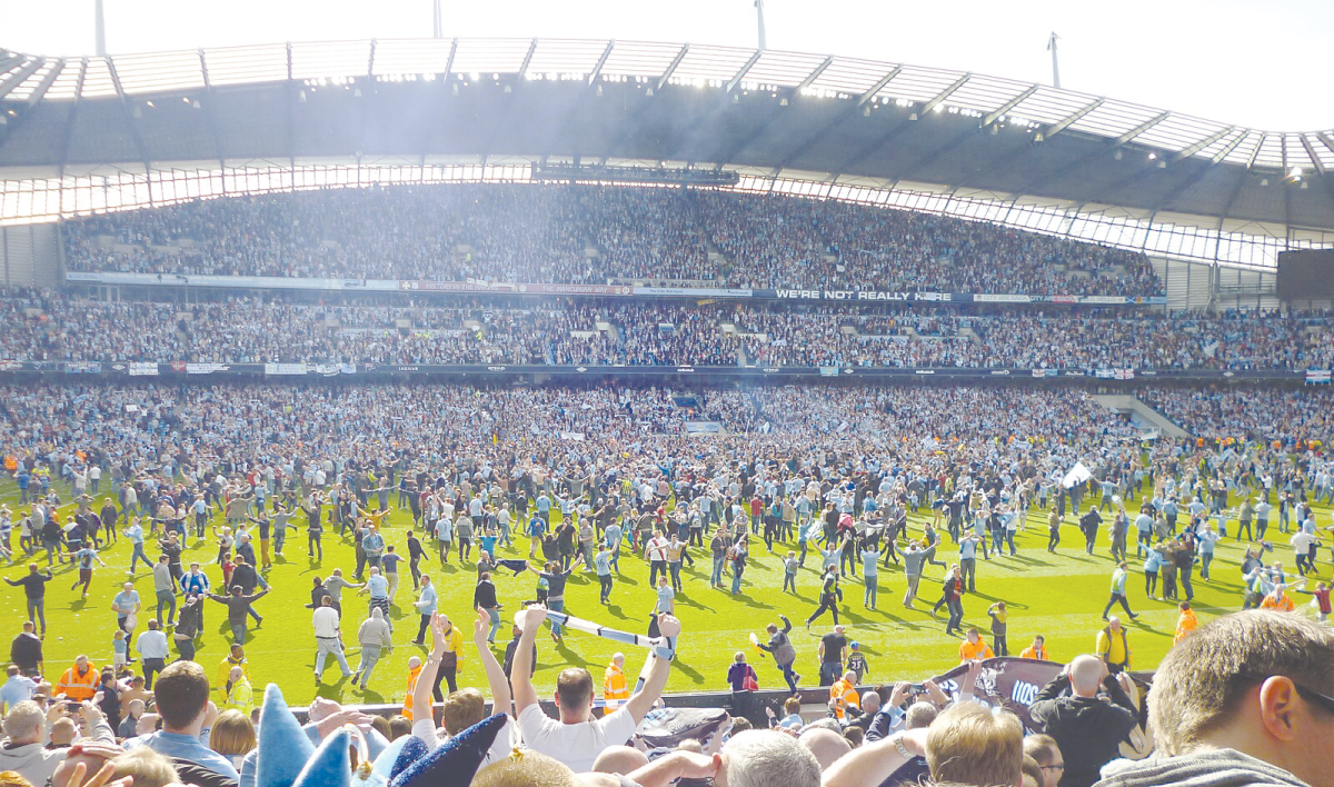 Manchester City Pitch Invasion, from Unsplash