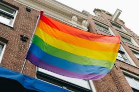 An LQBTQ+ pride flag from Unsplash