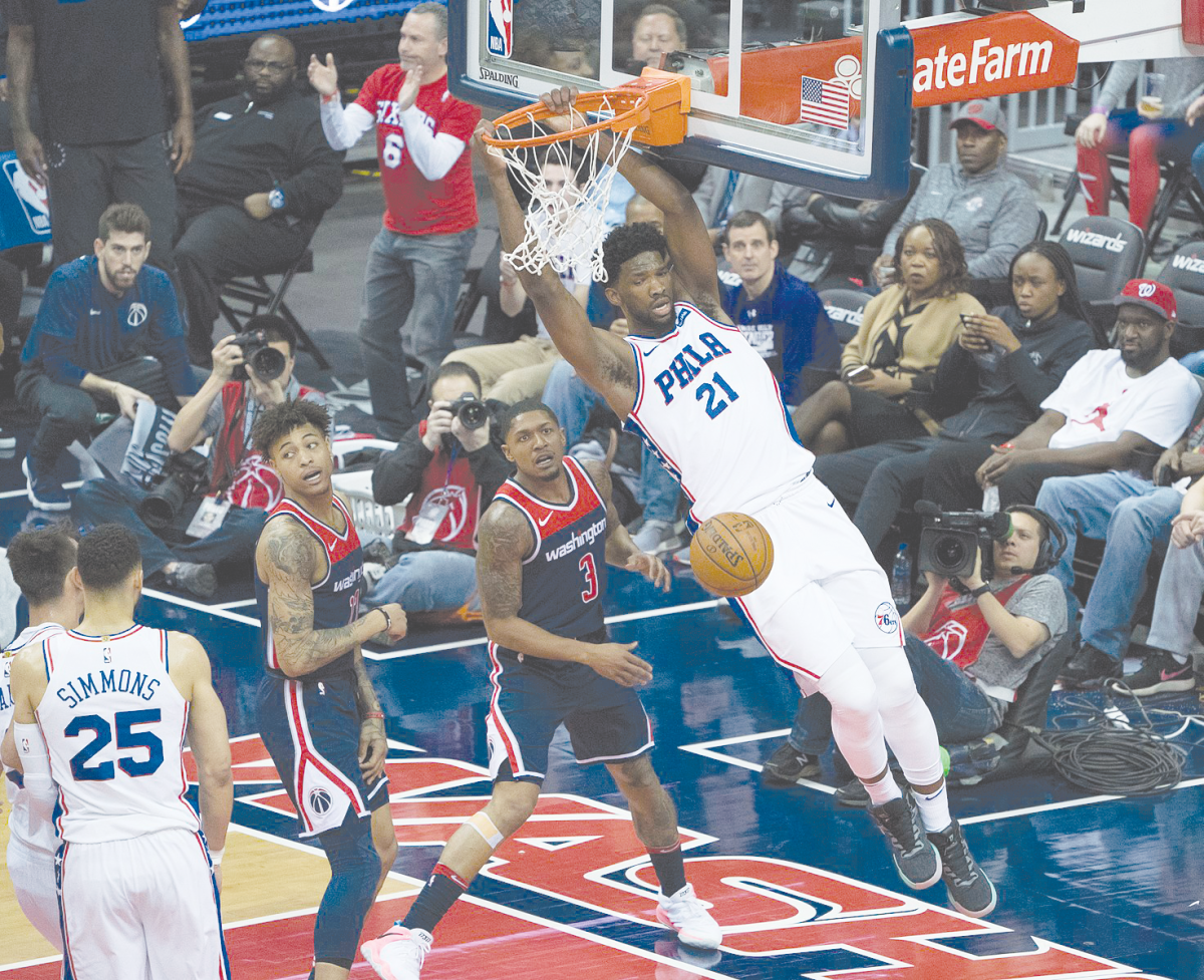 Joel Embiid dunks a basketball during a game against
the Washington Wizards on February 25, 2018. Joel
Embiid 2018 by Keith Allison is licensed under the CC
By Attribution 2.0 Generic Deed.