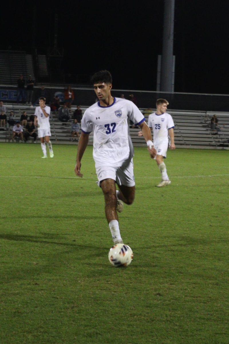 Defender Yazan Yaghmmour taking the ball down the field