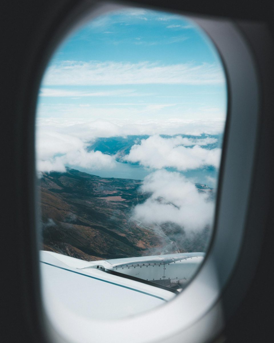 Plane window view, photo from Unsplash