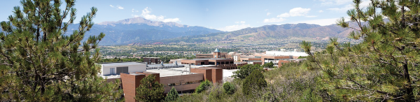 University of Colorado Colorado Springs main campus
from the bluffs, looking west towards Pikes Peak. UCCS
Summer Panoramic by Jeffrey M Foster is licensed under
the CC By Attribution Sharealike 4.0 International Deed.