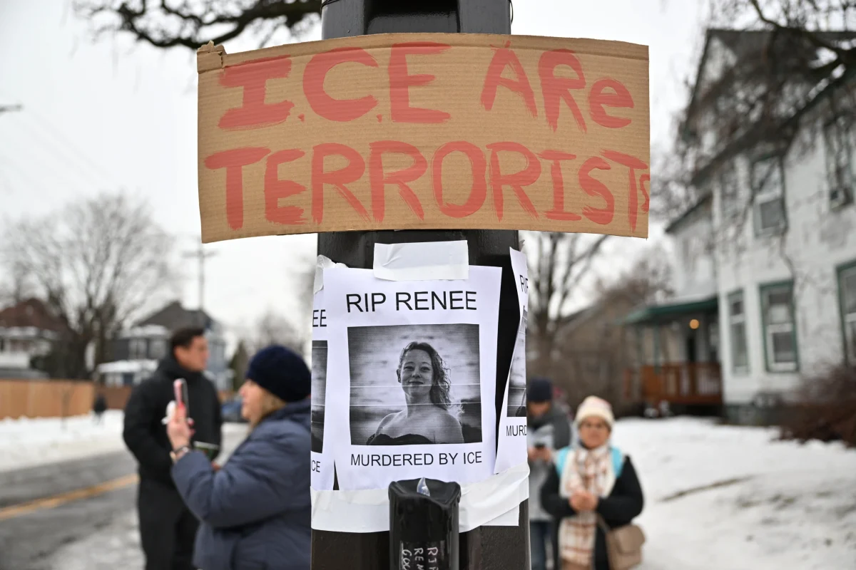 Makeshift memorial for Renee Good near the sight of the shooting, photo taken by Tom Baker/AP News.